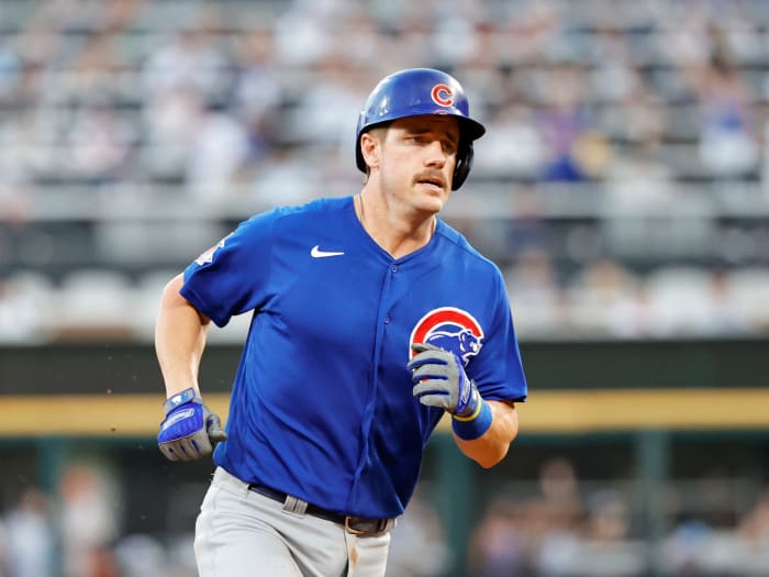 Aug 28, 2021; Chicago, Illinois, USA; Chicago Cubs third baseman Patrick Wisdom (16) rounds the bases after hitting a solo home run against the Chicago White Sox during the fourth inning at Guaranteed Rate Field.